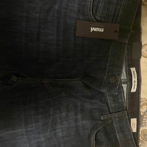 Navy blue jeans 38/30 to never worn text.